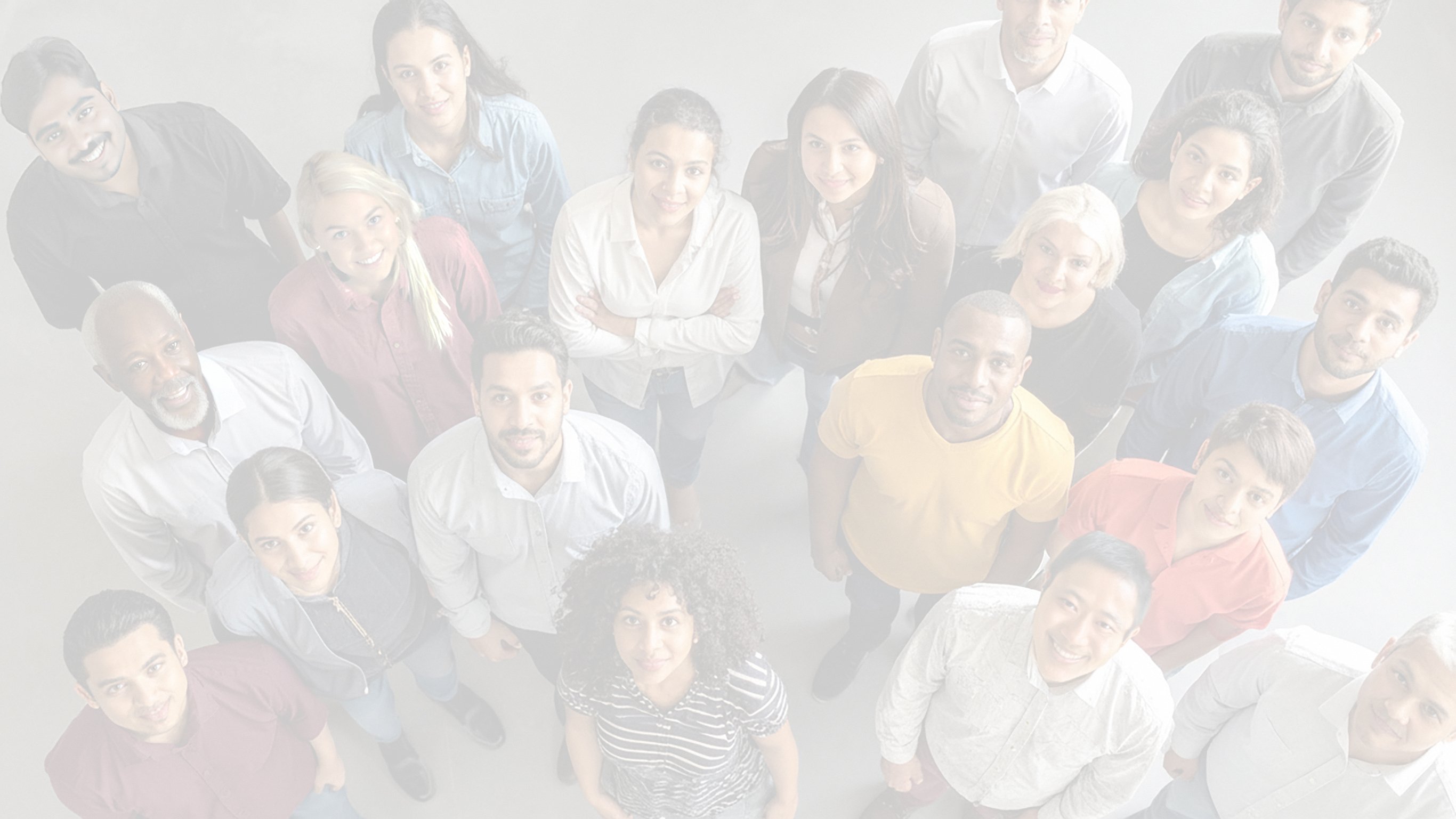 Group of people smiling and looking up